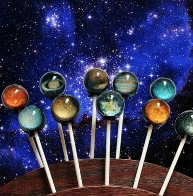 Caramelo de la piruleta de la galaxia que hace la máquina proveedor